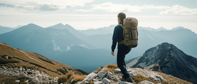 Person hiking in mountains